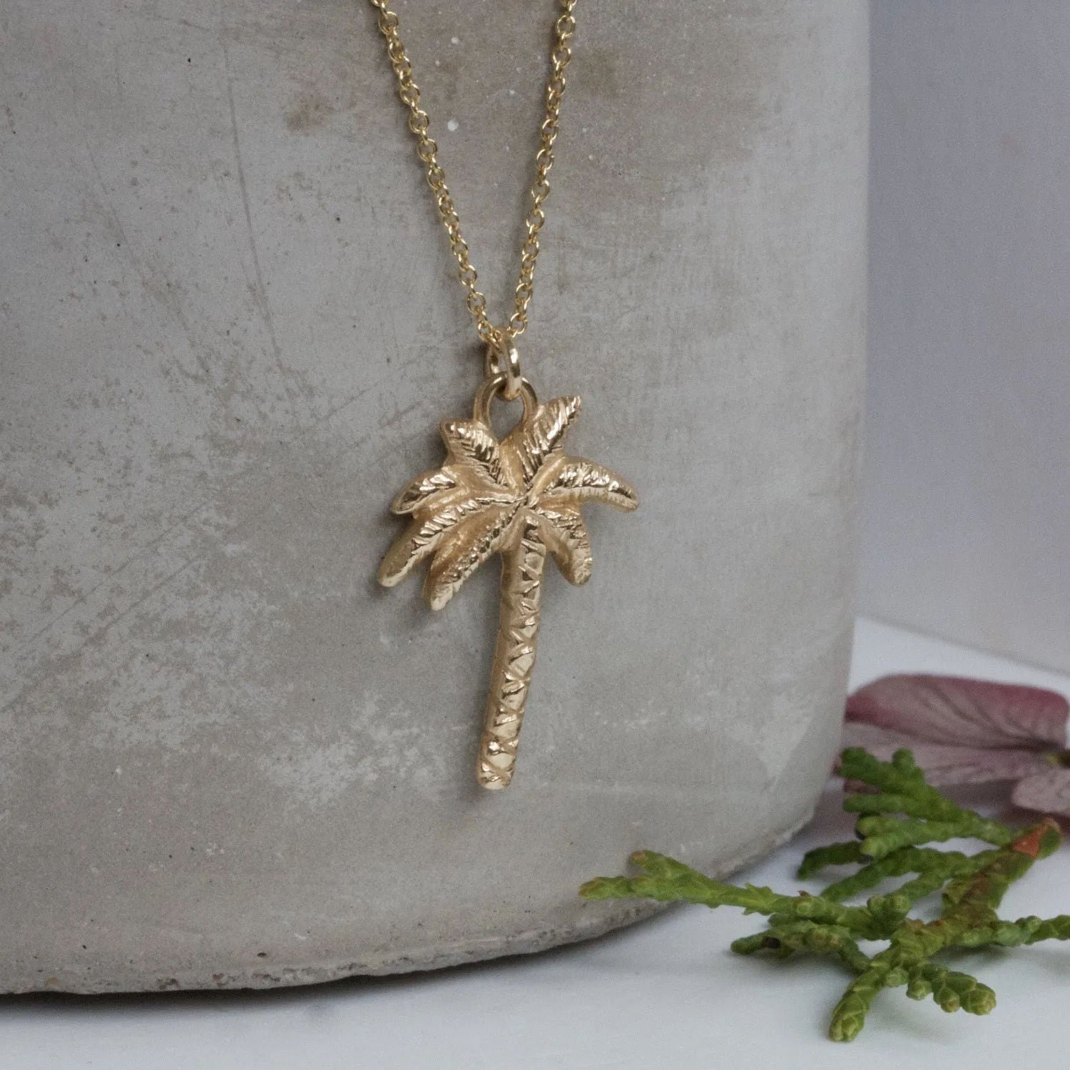 Gold necklace with palm on sale tree