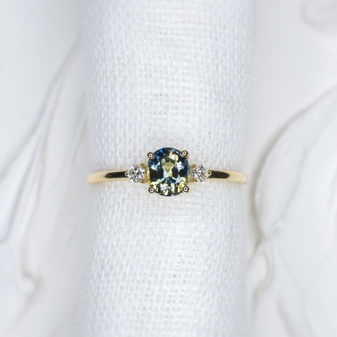 0.75ct Peacock Parti Sapphire Aurora Triad - Lelya - bespoke engagement and wedding rings made in Scotland, UK