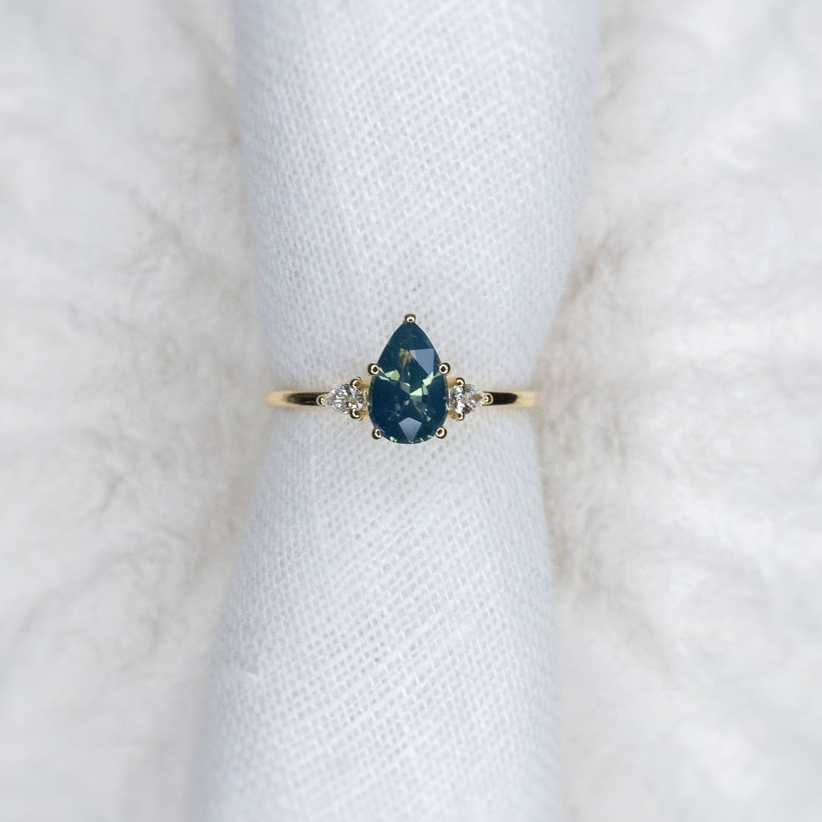 1.13ct Pear Teal Sapphire Gaia Triad Ring - Lelya - bespoke engagement and wedding rings made in Scotland, UK