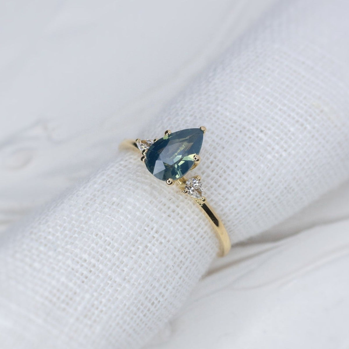 1.13ct Pear Teal Sapphire Gaia Triad Ring - Lelya - bespoke engagement and wedding rings made in Scotland, UK