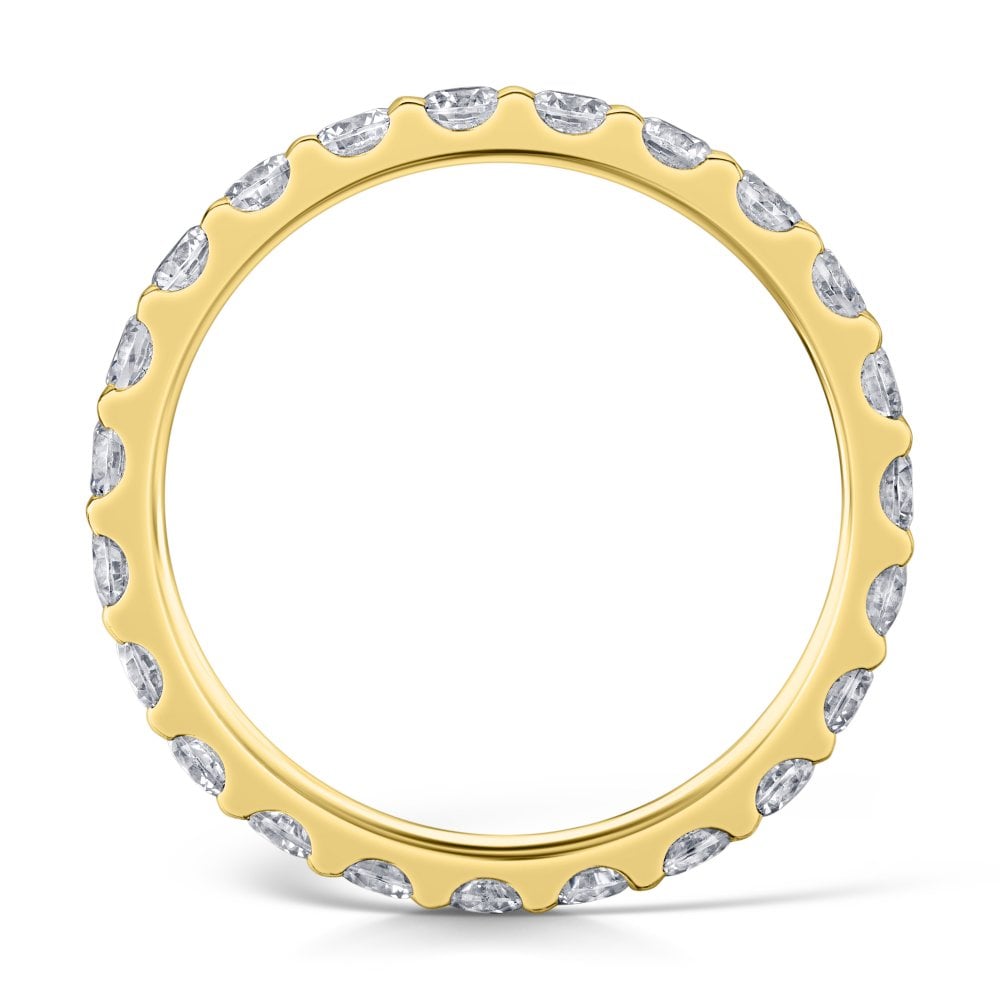 Side view of a 2.5mm Yellow gold eternity ring with round diamonds set all the way around on a white background.