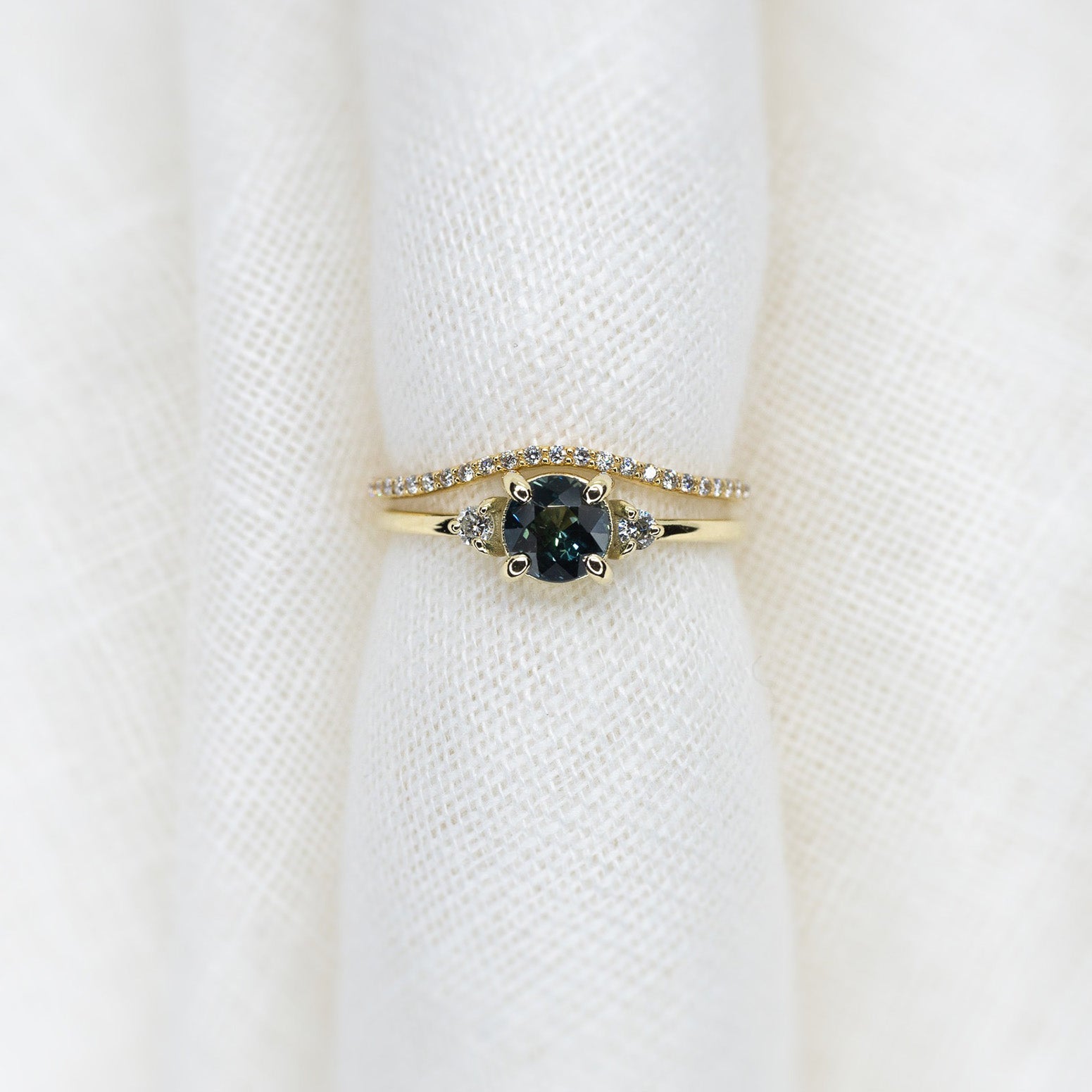 Round Cut 0.77ct Teal Sapphire Halley Triad - Lelya - bespoke engagement and wedding rings made in Scotland, UK