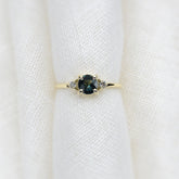 Round Cut 0.77ct Teal Sapphire Halley Triad - Lelya - bespoke engagement and wedding rings made in Scotland, UK